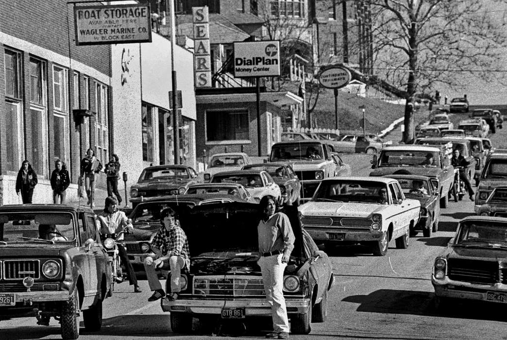 Main Streets & Town Squares, history of Iowa, traffic, Ottumwa, IA, Iowa History, Lemberger, LeAnn, storefront, Motorized Vehicles, Businesses and Factories, truck, car, motorcycle, Iowa, Cities and Towns, sign