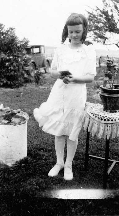 first communion, history of Iowa, plants, girl, USA, car, Iowa, Shaw, Marilyn, Portraits - Individual, Children, Iowa History, Religion