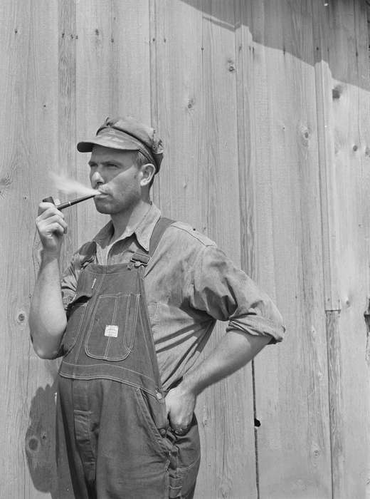 farmer, history of Iowa, Iowa History, Library of Congress, tobacco pipe, smoking, Iowa, wooden building, overalls, Portraits - Individual