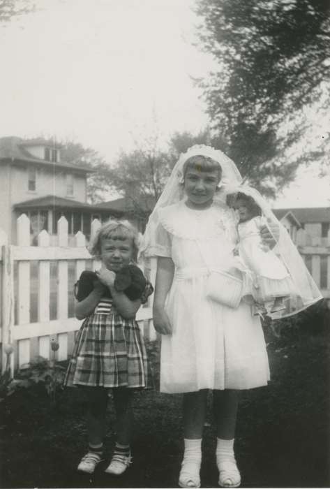 Portraits - Group, first communion, Iowa, Waterloo, IA, Religion, Children, veil, history of Iowa, fence, doll, Cain-Garrison, Shirley and Ginnie, Iowa History