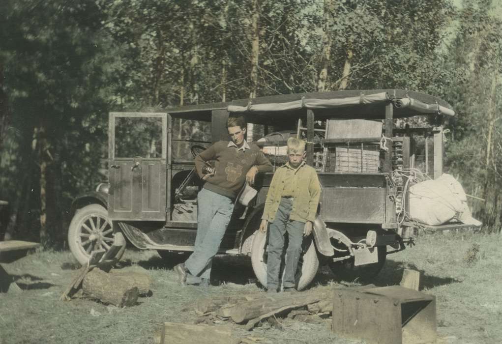 Travel, lumberjack, history of Iowa, Iowa History, Motorized Vehicles, state park, ford, truck, wood, camper, coat, Iowa, colorized, tree, Park Rapids, MN, McMurray, Doug, Children