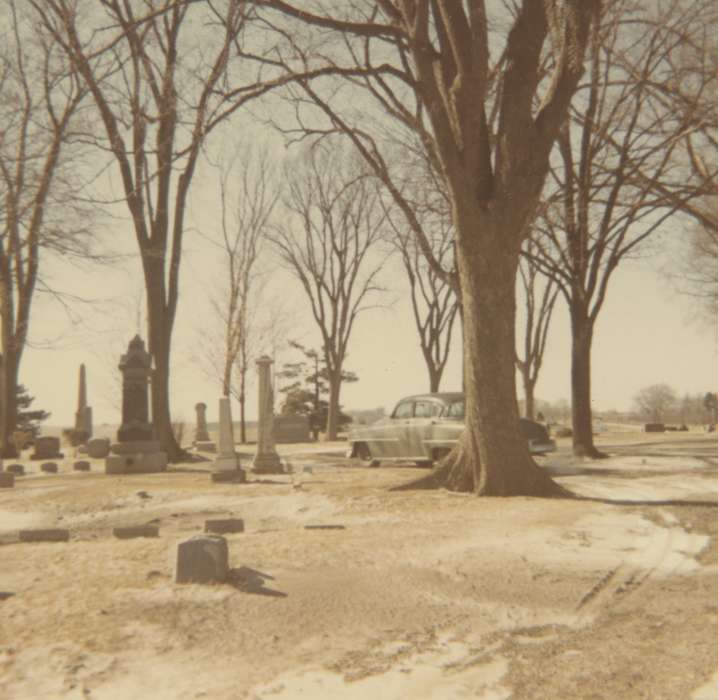 Cemeteries and Funerals, history of Iowa, Iowa History, headstone, Motorized Vehicles, graveyard, Cain-Garrison, Shirley and Ginnie, car, Iowa, Waterloo, IA