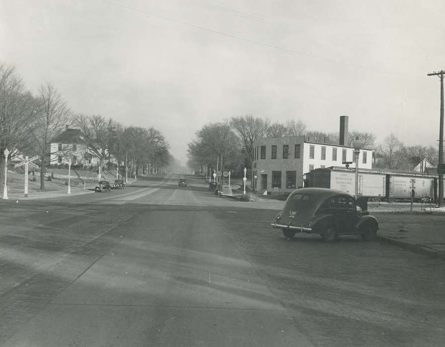 history of Iowa, Businesses and Factories, brick street, Waverly, IA, Main Streets & Town Squares, railroad track, main street, Motorized Vehicles, Iowa, Waverly Public Library, train car, Iowa History, correct date needed, Cities and Towns, cars