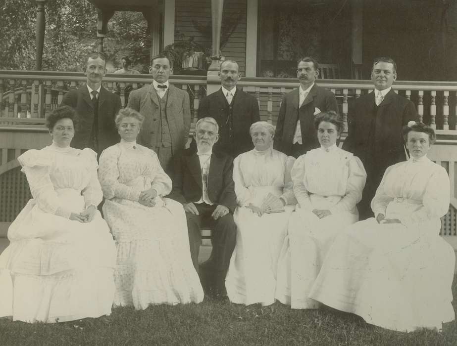 Portraits - Group, bow tie, history of Iowa, Iowa History, Families, beard, glasses, Iowa, moustache, porch, dress, Waverly Public Library, suit, railing