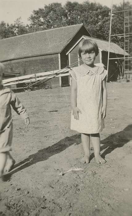 shed, girl, Portraits - Individual, Iowa History, Iowa, Koch, Ethel Ann, Farms, Ackley, IA, Children, history of Iowa