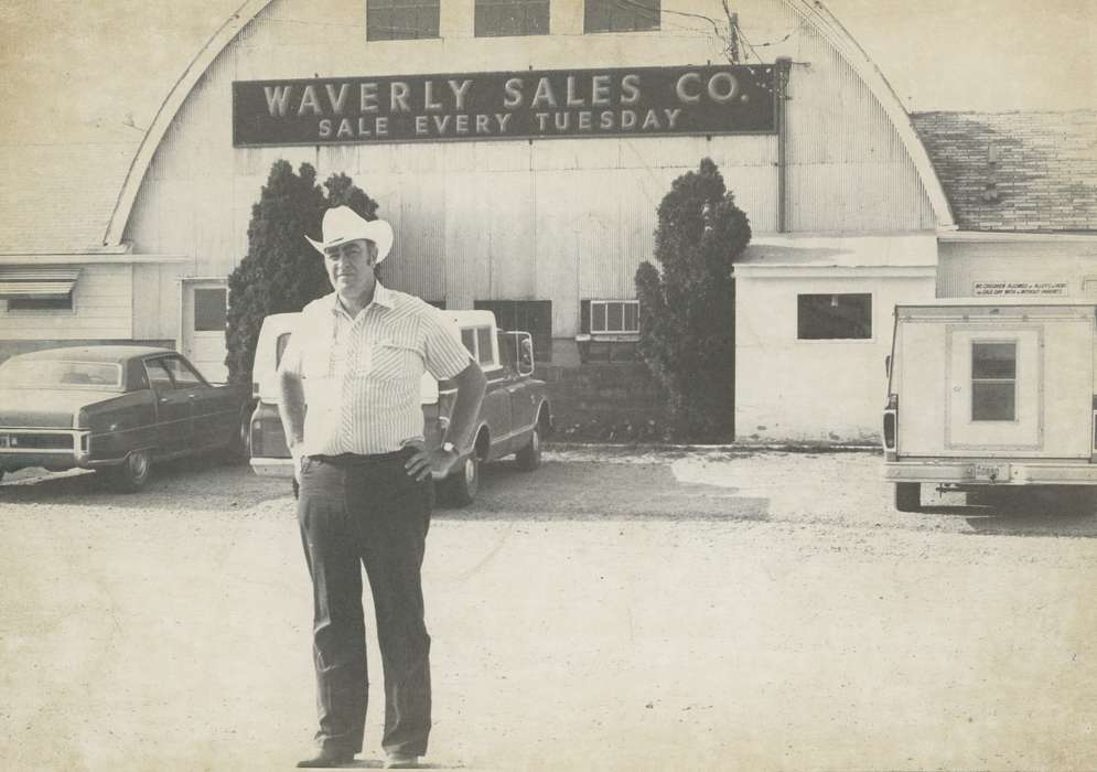 Portraits - Individual, sign, history of Iowa, window, man, Businesses and Factories, Waverly, IA, Waverly Public Library, Iowa, Motorized Vehicles, cowboy hat, building, Iowa History, correct date needed