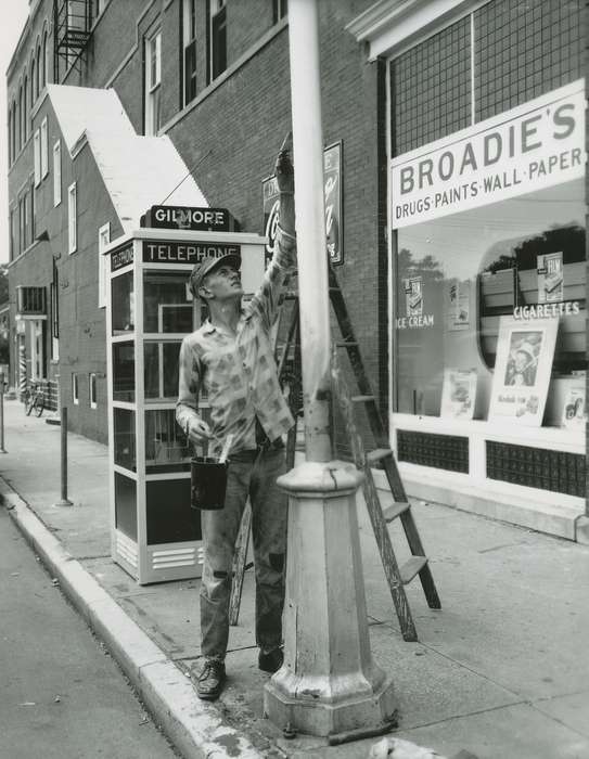 Main Streets & Town Squares, phone booth, Iowa History, general store, history of Iowa, storefront, Businesses and Factories, Iowa, painter, Cities and Towns, paint can, utility pole, Waverly Public Library, Labor and Occupations