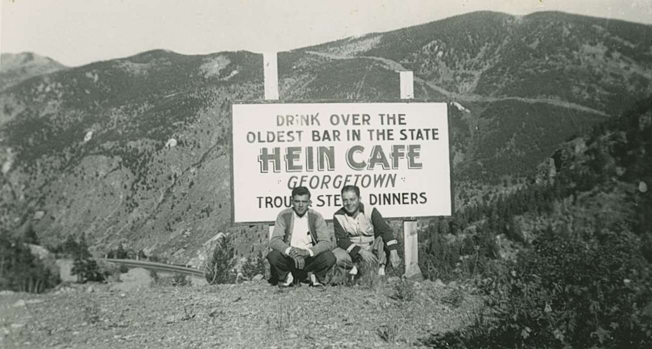 Travel, history of Iowa, men, forest, Campopiano Von Klimo, Melinda, mountain, valley, Iowa, Georgetown, CO, advertisement, cafe, Leisure, sign, hein cafe, Iowa History, Portraits - Group