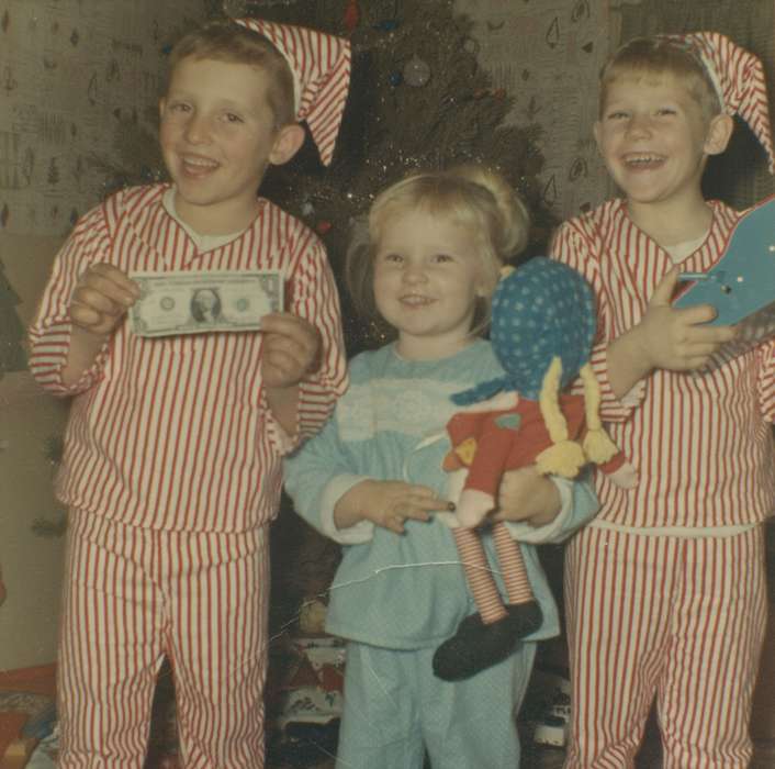 Portraits - Group, dollar, christmas, history of Iowa, Iowa History, christmas tree, smile, Peck, Dona, christmas presents, Holidays, pajamas, Postville, IA, doll, Iowa, silly, Children