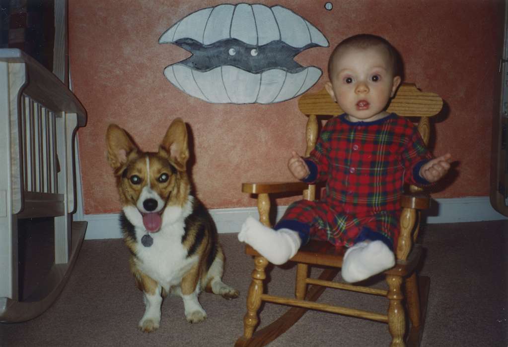 baby, corgi, Iowa, rocking chair, Animals, clam, dog, Children, Lucy, Keith, history of Iowa, High Point, NC, Iowa History