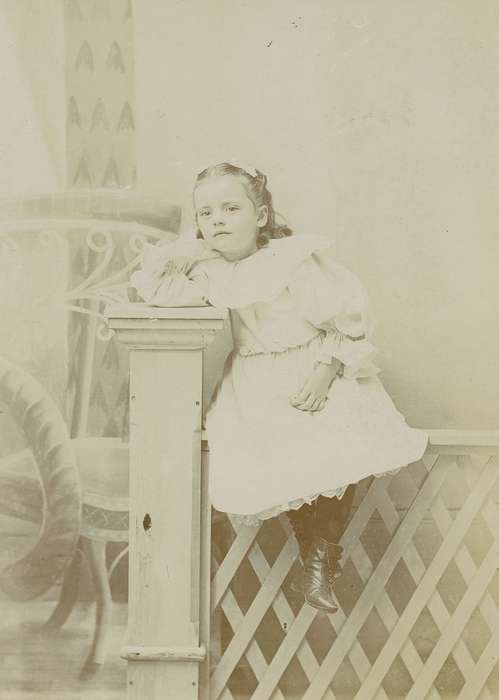 petticoat, Iowa, Redfield, IA, lace, Olsson, Ann and Jons, Portraits - Individual, fence, painted backdrop, girl, history of Iowa, cabinet photo, Iowa History