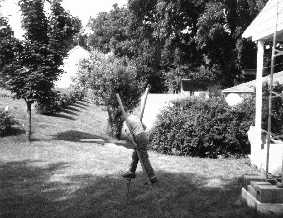 bushes, history of Iowa, Iowa History, Entertainment, lawn, stilts, Ely, IA, Iowa, boy, house, tree, Children, Karns, Mike