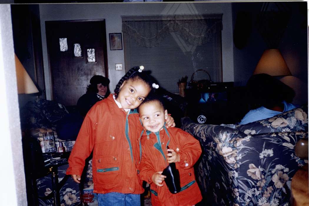 Portraits - Group, couch, Iowa, Waterloo, IA, Lewis, Marsha, Families, Children, living room, jacket, Homes, People of Color, african american, history of Iowa, siblings, Iowa History