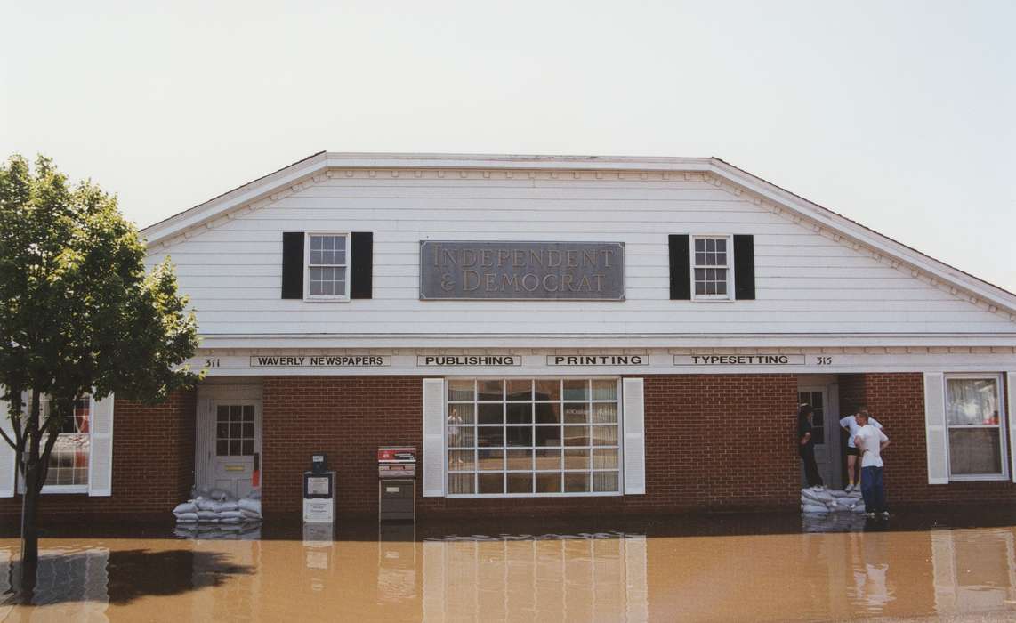 Waverly Public Library, Floods, history of Iowa, Iowa History, newspaper, window, Businesses and Factories, Civic Engagement, Waverly, IA, office, printing, Iowa, sandbag, Leisure