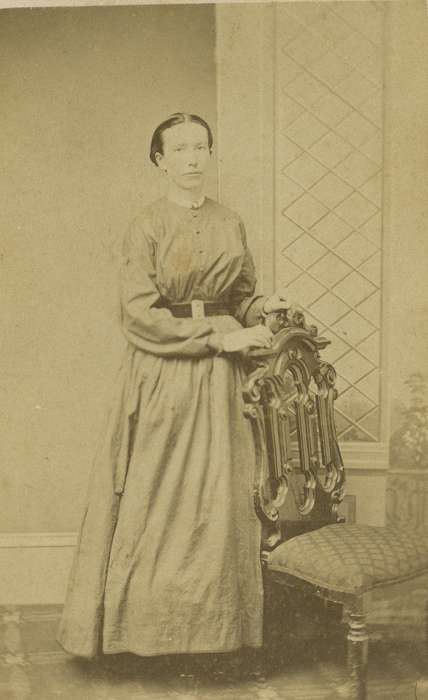 carte de visite, Iowa, woman, chair, patterned carpet, hoop skirt, Olsson, Ann and Jons, Portraits - Individual, painted backdrop, Ottumwa, IA, collared dresses, history of Iowa, dropped shoulder seams, Iowa History