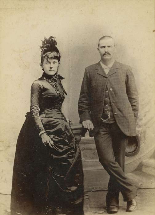 Portraits - Group, sack coat, pocket watch chain, feather hat, IA, Iowa, vest, couple, woman, Olsson, Ann and Jons, dress, point of interest, man, mustache, history of Iowa, cabinet photo, Iowa History