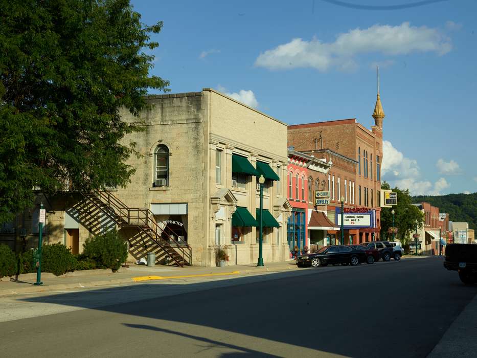 mainstreet, Main Streets & Town Squares, fire escape, history of Iowa, Iowa History, Library of Congress, storefront, Motorized Vehicles, Businesses and Factories, brick building, jewelry store, movie theater, Iowa, Cities and Towns, chiropractic clinic