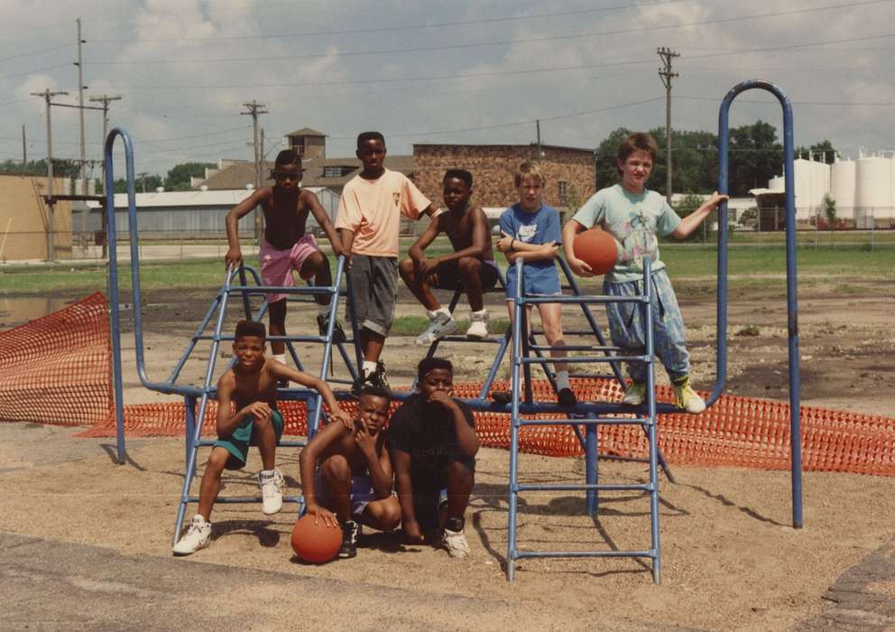 Portraits - Group, african american, Children, Waterloo, IA, Iowa, Schools and Education, Iowa History, Moore, Doris, jungle gym, basketball, Leisure, history of Iowa, People of Color