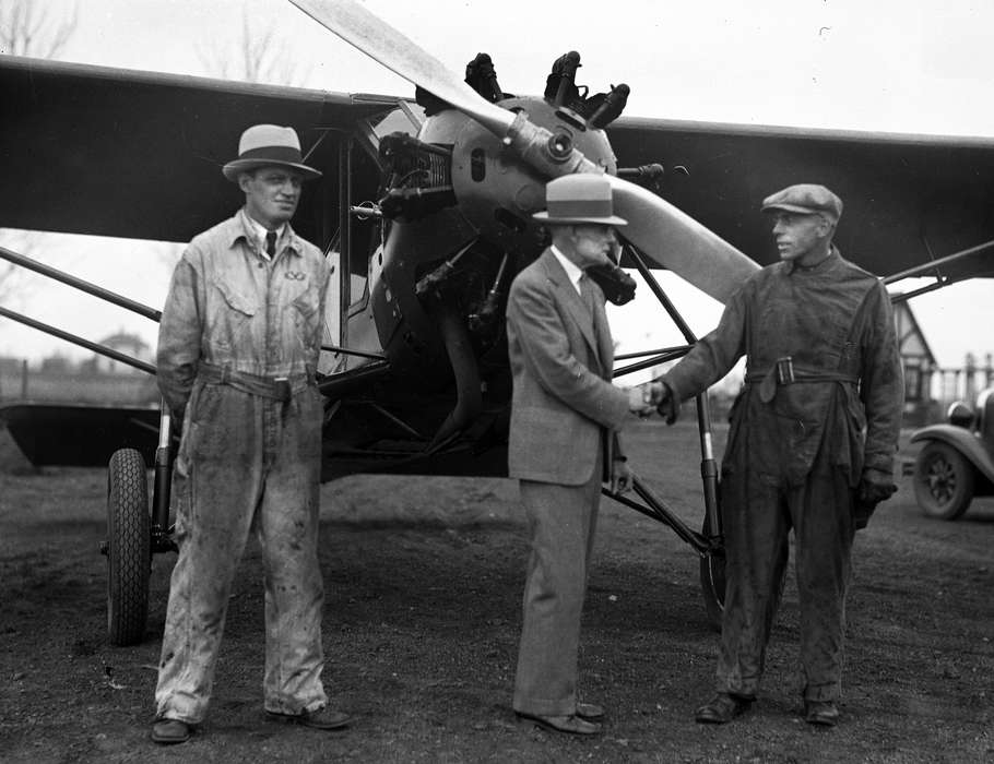 handshake, history of Iowa, plane, Ottumwa, IA, Iowa History, Motorized Vehicles, airplane, Iowa, Lemberger, LeAnn, mechanic, Labor and Occupations
