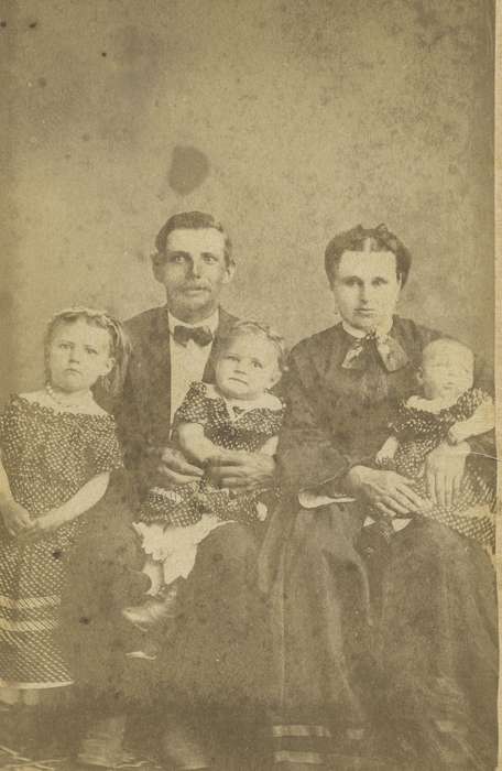 baby, woman, earrings, Children, sisters, hoop skirt, family, man, history of Iowa, Iowa History, Portraits - Group, carte de visite, Iowa, child, necklace, Families, children, Olsson, Ann and Jons, dress, toddler, Belle Plaine, IA, girl, siblings, dropped shoulder seams, pantaloons