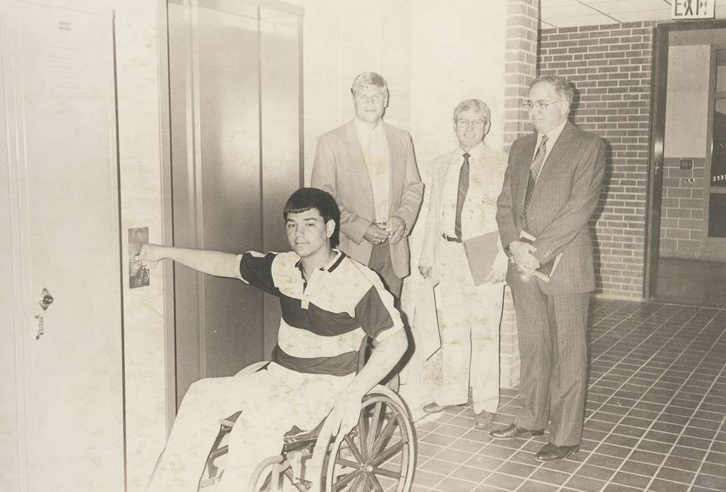 elevator, high school, history of Iowa, Portraits - Group, Waverly Public Library, Waverly, IA, Iowa, suit, tie, Iowa History, Schools and Education, glasses, correct date needed, wheelchair