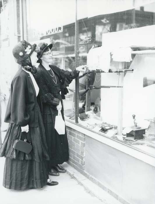 history of Iowa, hat, purse, Portraits - Group, Businesses and Factories, necklace, woman, Main Streets & Town Squares, storefront, window display, Iowa, gun, Waverly Public Library, costume, coffee grinder, Iowa History