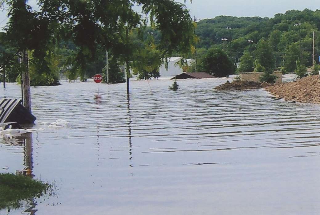 Cities and Towns, Lakes, Rivers, and Streams, trash, Iowa History, street flooded, Floods, Iowa, history of Iowa, stop sign, roof, disaster, Anamosa, IA, Hatcher, Cecilia
