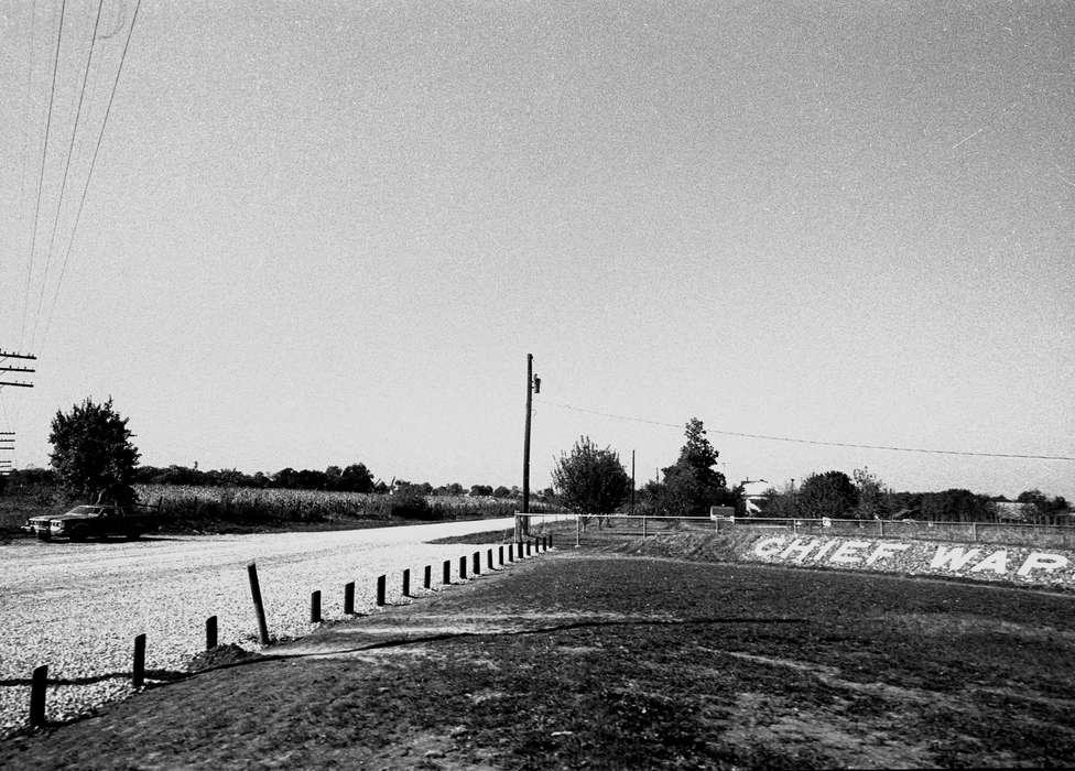 telephone pole, Cemeteries and Funerals, gravel road, Iowa History, headstone, history of Iowa, Lemberger, LeAnn, Motorized Vehicles, grave, field, car, Iowa, Agency, IA, Cities and Towns, sign