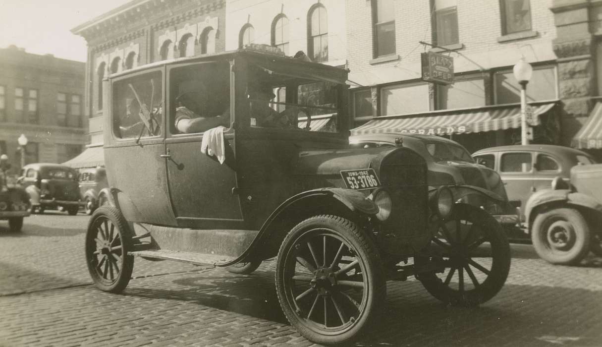 Owen, Jeff, Iowa, parade, brick, car, Monticello, IA, history of Iowa, Motorized Vehicles, Main Streets & Town Squares, Iowa History, license plate