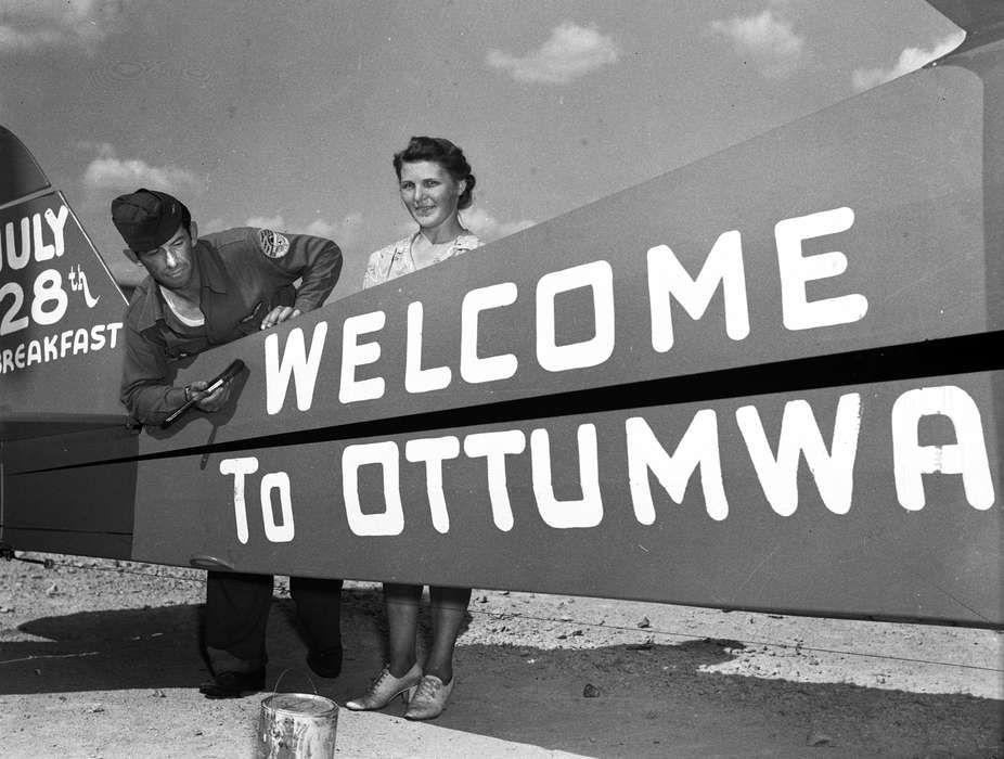 Portraits - Group, history of Iowa, plane, Ottumwa, IA, Iowa History, Motorized Vehicles, airplane, Iowa, Lemberger, LeAnn, sign, Labor and Occupations