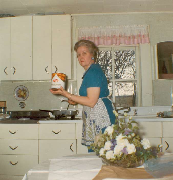 Food and Meals, centerpiece, Iowa, kitchen, flowers, cooking, mid-century modern, woman, Dike, IA, Fuller, Steven, Portraits - Individual, history of Iowa, apron, Iowa History