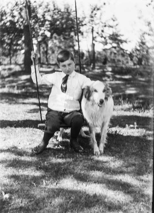 boy, IA, Iowa, Animals, dog, Children, Portraits - Individual, swing, Anamosa Library & Learning Center, history of Iowa, Iowa History