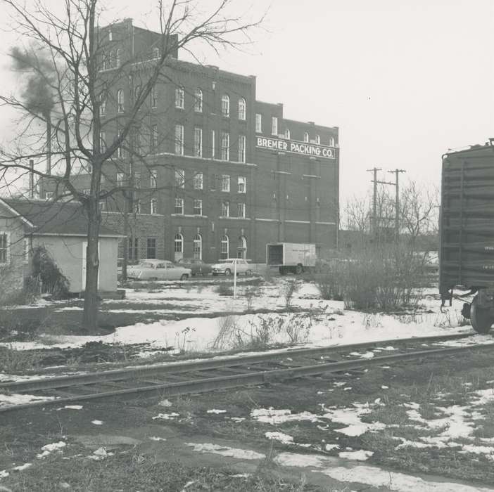 history of Iowa, Businesses and Factories, snow, Waverly, IA, Waverly Public Library, railroad track, car, Motorized Vehicles, Iowa, Winter, brick building, Iowa History, correct date needed, chicken processing plant, truck