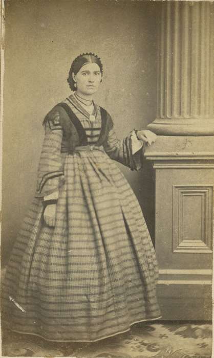 carte de visite, Iowa, necklace, woman, earrings, column, patterned carpet, hoop skirt, pillar, Portraits - Individual, dress, Olsson, Ann and Jons, history of Iowa, Decorah, IA, brooch, dropped shoulder seams, Iowa History