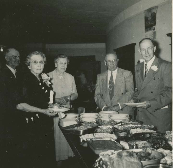 Portraits - Group, gathering, calendar, potluck, history of Iowa, Iowa History, carnation, buffet, IA, Taylor, Marcia, corsage, glasses, Iowa, Food and Meals, suit