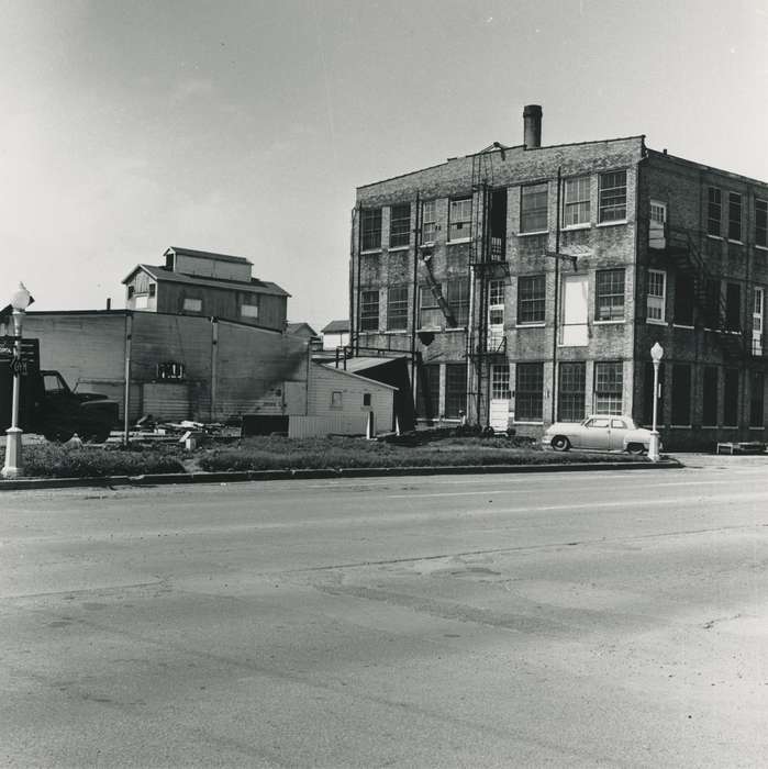 history of Iowa, stairs, Businesses and Factories, Waverly, IA, Waverly Public Library, Iowa, car, fire escape, debris, brick building, road, Iowa History, correct date needed, street light, canning, Wrecks