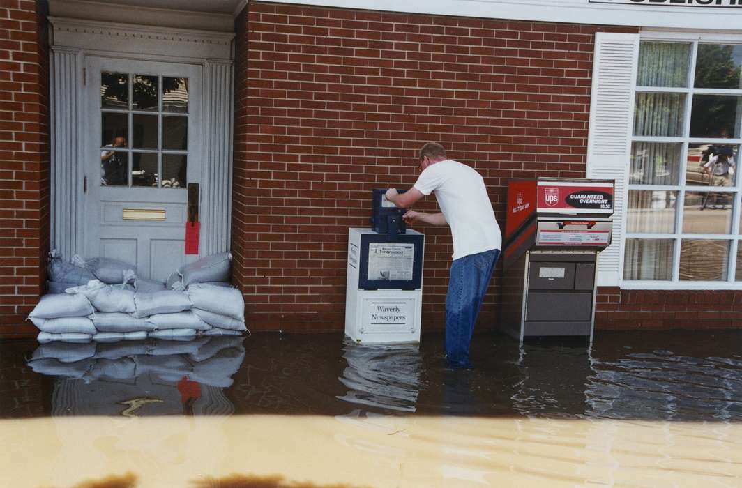 Waverly Public Library, Floods, jeans, Iowa History, newspaper, history of Iowa, Businesses and Factories, blue jeans, Waverly, IA, water, Iowa, sandbag, Leisure, ups
