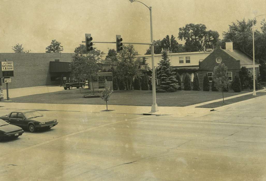 Cities and Towns, pine trees, first national bank, correct date needed, Motorized Vehicles, Waverly Public Library, Aerial Shots, Main Streets & Town Squares, cars, intersection, Iowa, history of Iowa, Iowa History, Businesses and Factories, stoplight