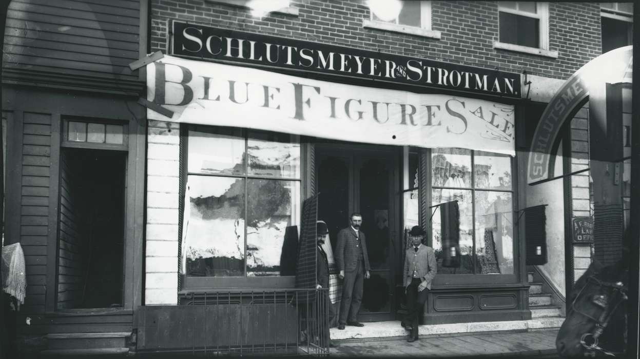 Portraits - Group, window, Iowa, Waverly Public Library, bowler hat, Iowa History, hat, sign, Cities and Towns, Businesses and Factories, history of Iowa, Waverly, IA, Main Streets & Town Squares, suit, Labor and Occupations