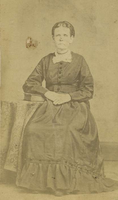 carte de visite, IA, Iowa, necklace, table, woman, bishop sleeves, hoop skirt, Olsson, Ann and Jons, Portraits - Individual, dress, book, tablecloth, history of Iowa, dropped shoulder seams, Iowa History