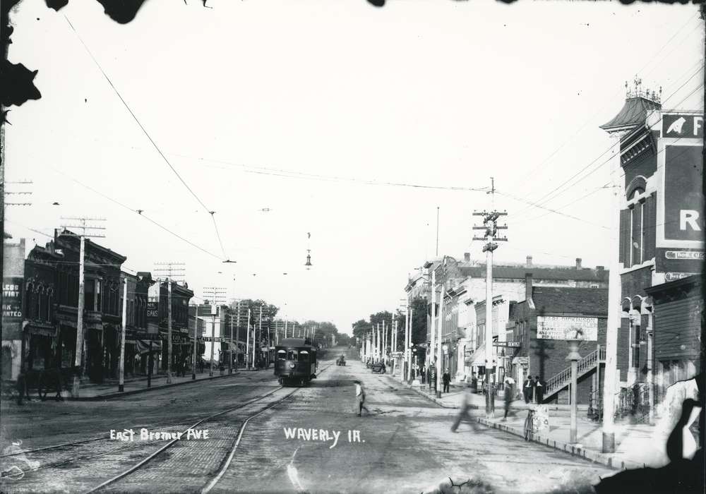 Travel, train, Iowa, Waverly Public Library, shops, trolley, power lines, cart, Cities and Towns, Businesses and Factories, history of Iowa, Waverly, IA, Main Streets & Town Squares, Iowa History