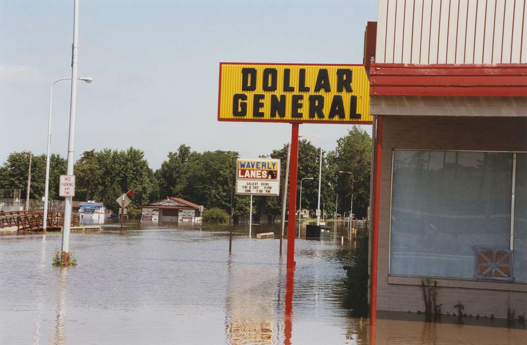 Main Streets & Town Squares, Floods, main street, bridge, street sign, Iowa History, history of Iowa, bowling alley, Businesses and Factories, dollar store, Waverly, IA, water, street light, Iowa, dollar general, Cities and Towns, Waverly Public Library, bowling