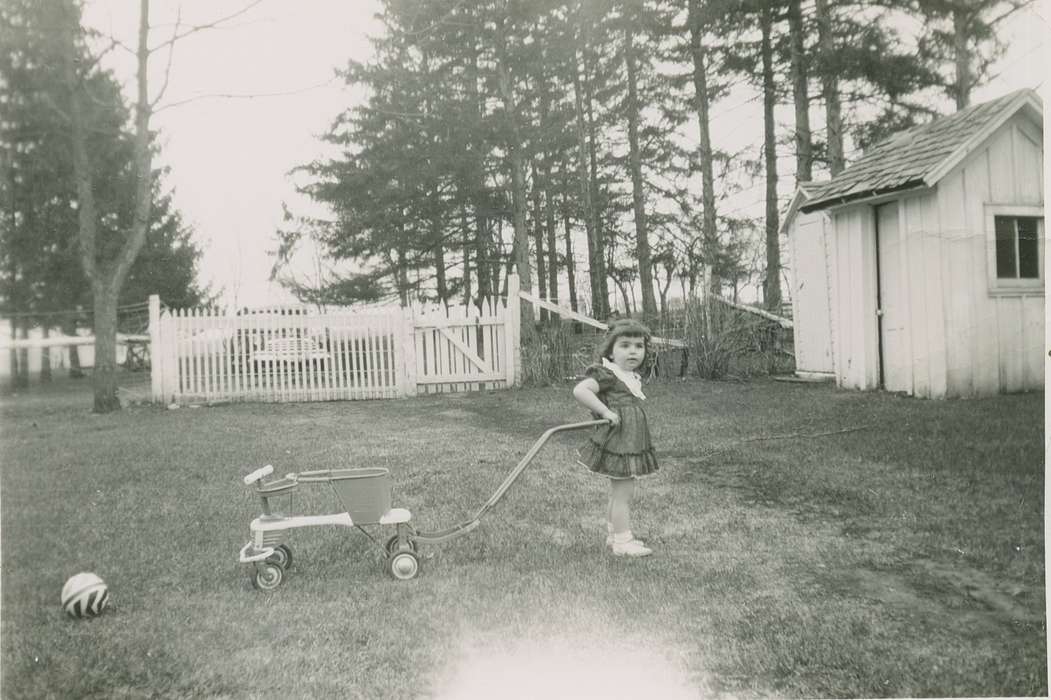 yard, Geneva, IA, history of Iowa, Iowa History, girl, shed, wagon, ball, Malcolm, Cindy, Iowa, fence, Children, Leisure, Portraits - Individual
