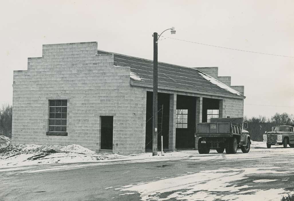 history of Iowa, Iowa History, Motorized Vehicles, brick building, dump truck, melting snow, Iowa, correct date needed, snow, Waverly Public Library