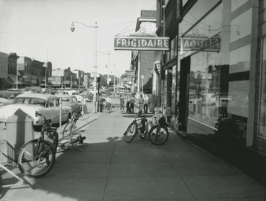 mainstreet, Main Streets & Town Squares, Waverly Public Library, history of Iowa, cars, Iowa History, Entertainment, storefront, Motorized Vehicles, Businesses and Factories, boys, Iowa, Cities and Towns, Children, Leisure, Outdoor Recreation