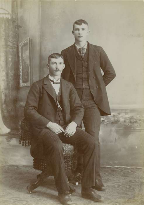 Portraits - Group, men, Iowa, Grinnell, IA, brothers, vest, chair, watch chain, Olsson, Ann and Jons, history of Iowa, painted backdrop, bow tie, cabinet photo, Iowa History