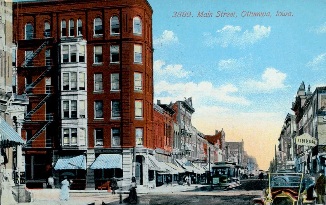 mainstreet, Ottumwa, IA, Iowa, storefront, veranda, fire escape, car, apartment, Lemberger, LeAnn, Cities and Towns, Businesses and Factories, history of Iowa, Motorized Vehicles, Main Streets & Town Squares, Iowa History, street car