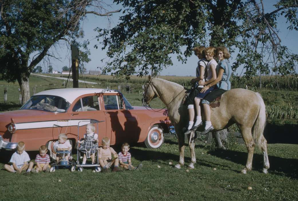 Portraits - Group, Ellsworth, IA, horseback riding, Iowa History, history of Iowa, Satre, Margaret, Families, Motorized Vehicles, Animals, car, Iowa, saddle, horse, Children