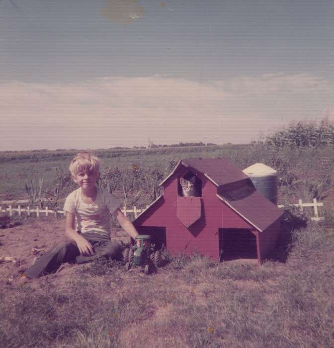 cat, history of Iowa, Iowa History, Barns, Animals, tractor, toy, Hansell, IA, Malcolm, Cindy, Iowa, Farms, Children, Portraits - Individual