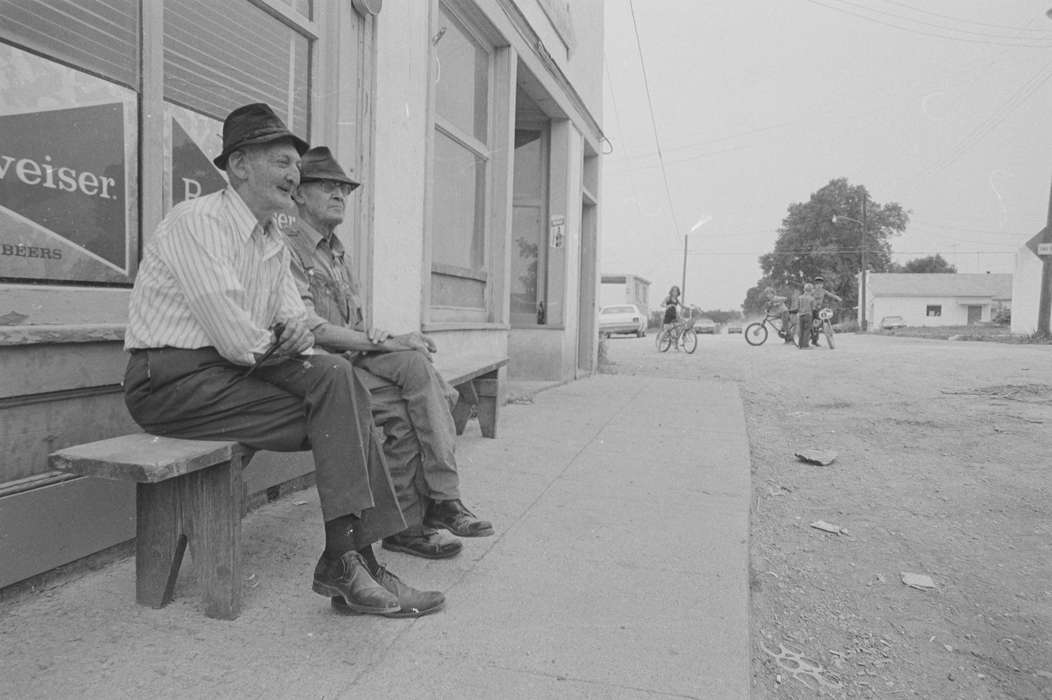 elderly, Iowa History, history of Iowa, Lemberger, LeAnn, storefront, Businesses and Factories, bicycle, Melrose, IA, dirt road, bike, Iowa, Cities and Towns, sign, Children, Leisure, bench
